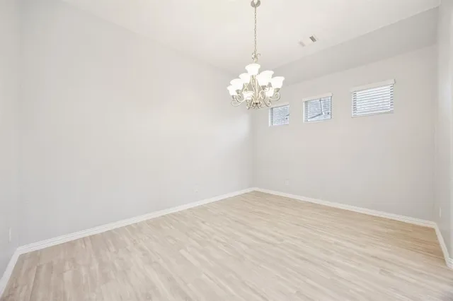 a view of a chandelier in a room