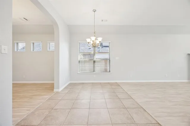 a view of an empty room with window
