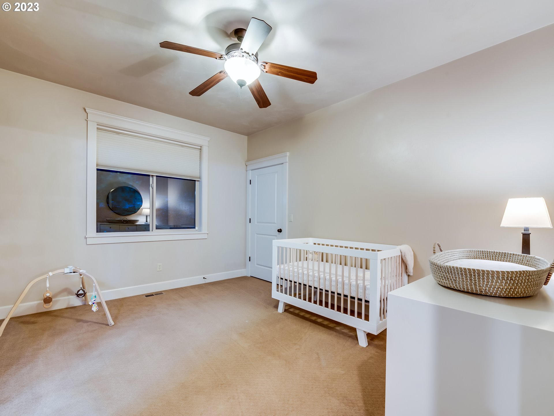 6251 Graystone Loop Springfield, OR 97478 - Photo 19 of 32 a bedroom with a bed and a window