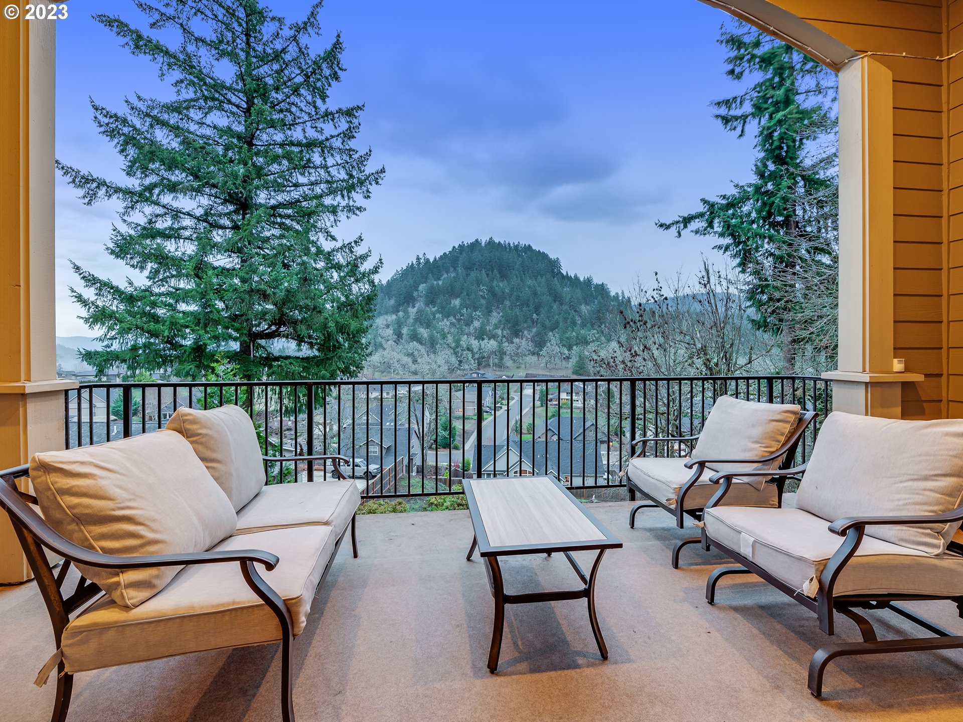 6251 Graystone Loop Springfield, OR 97478 - Photo 7 of 32 a view of a chair and table on the deck