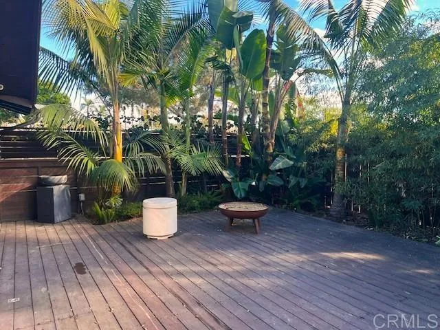 a backyard of a house with seating space