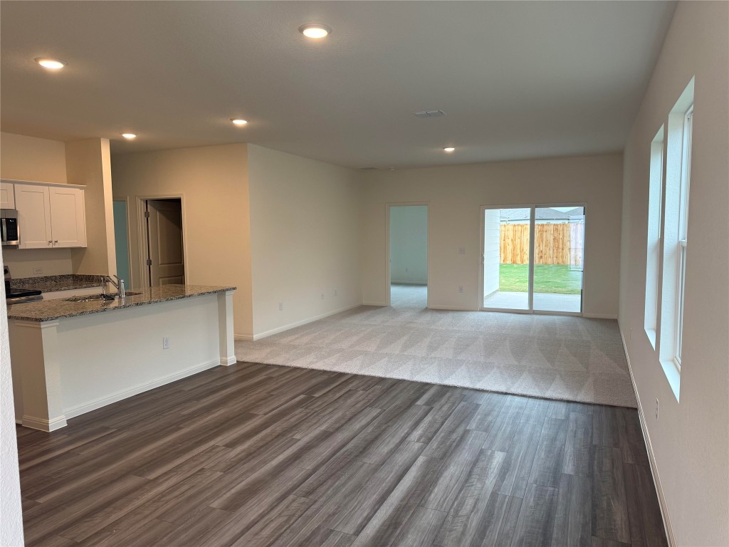 417 Wedemeyer Street Taylor, TX 76574 - Photo 3 of 15 a view of an empty room and window