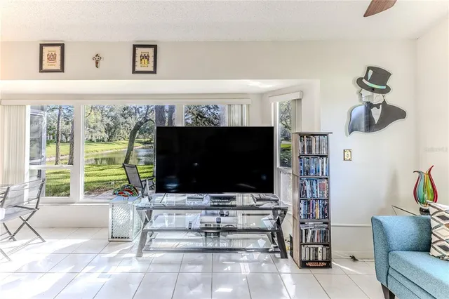 a kitchen with a sink appliances and cabinets
