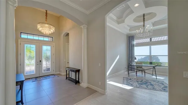 a kitchen with stainless steel appliances granite countertop a stove and cabinets