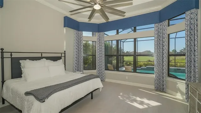 a bathroom with a granite countertop sink toilet and mirror