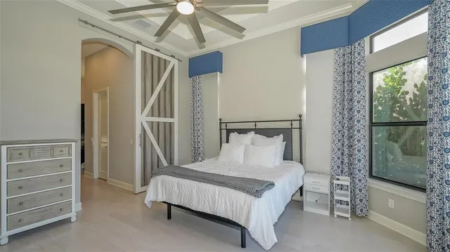 a patio with a patio table and chairs