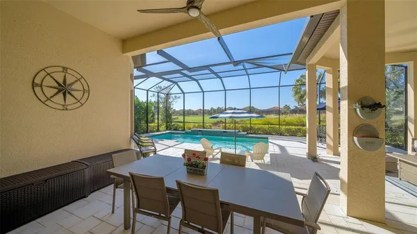 a front view of a house with a yard and a garage