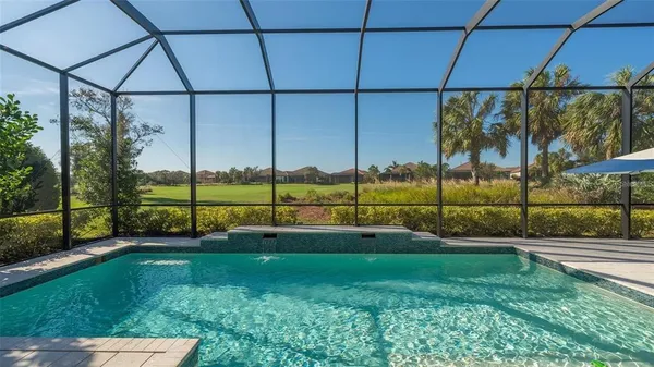 a group of people sitting outside of a restaurant