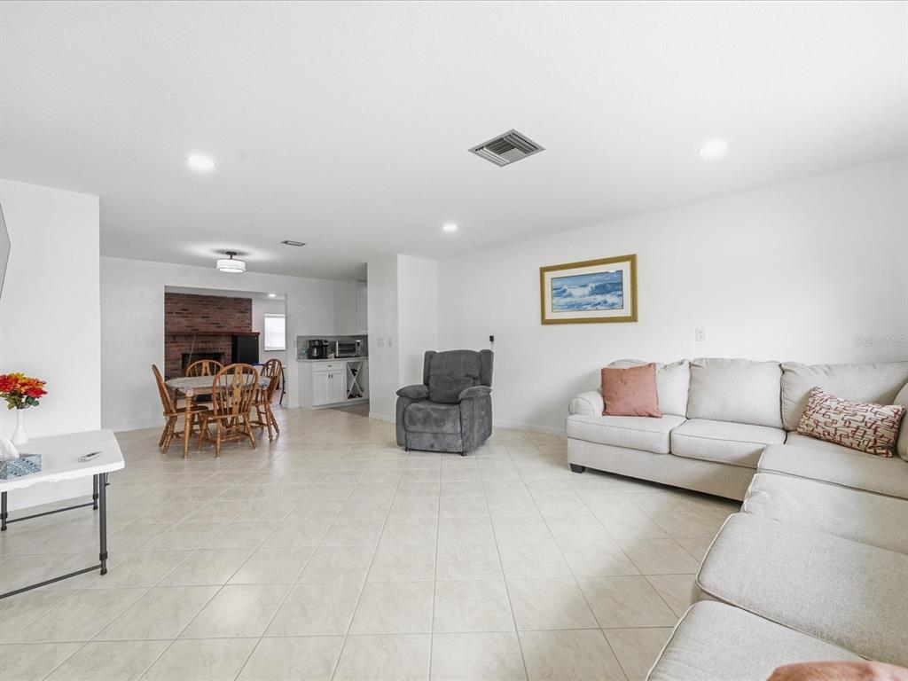 4069 Gulfview Drive Hernando Beach, FL 34607 - Photo 12 of 29 a living room with furniture and a couch