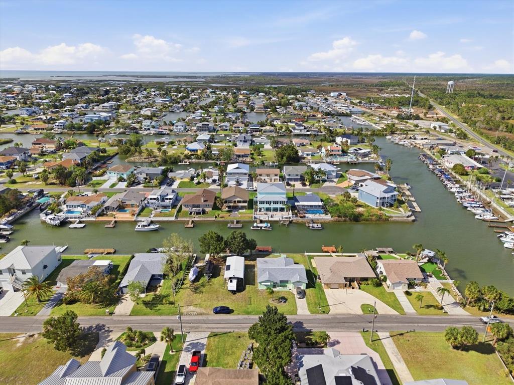 4069 Gulfview Drive Hernando Beach, FL 34607 - Photo 26 of 29 an aerial view of water body with boats and trees all around