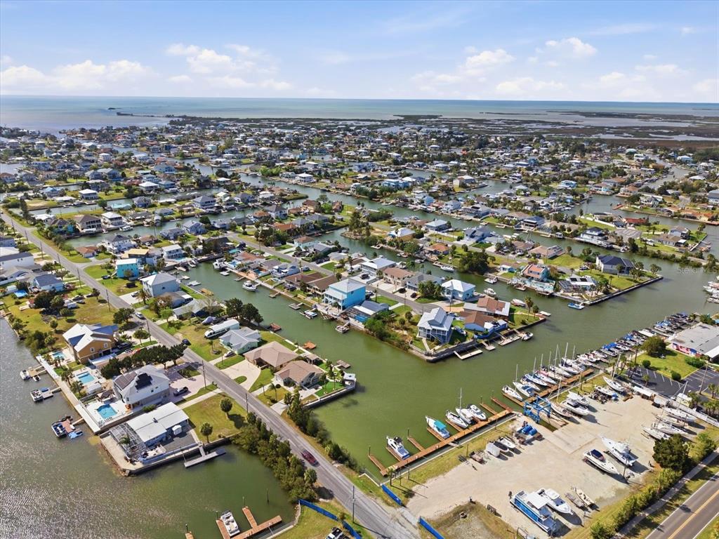 4069 Gulfview Drive Hernando Beach, FL 34607 - Photo 27 of 29 an aerial view of a city with ocean view