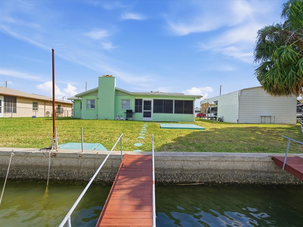 4069 Gulfview Drive Hernando Beach, FL 34607 - Photo 29 of 29 a view of a house with a swimming pool