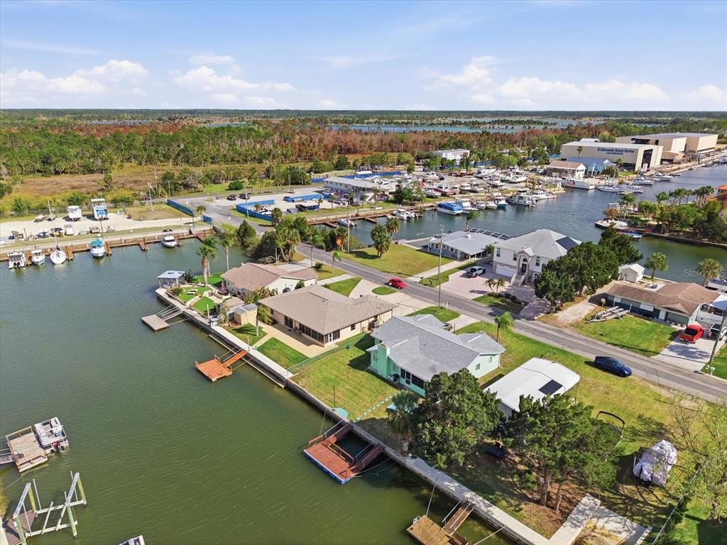 4069 Gulfview Drive Hernando Beach, FL 34607 - Photo 3 of 29 an aerial view of residential houses with outdoor space