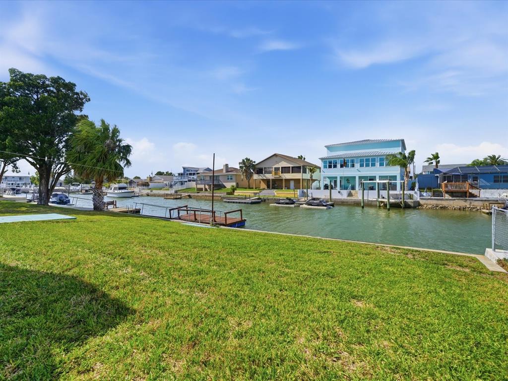 4069 Gulfview Drive Hernando Beach, FL 34607 - Photo 6 of 29 a view of a lake with a city view
