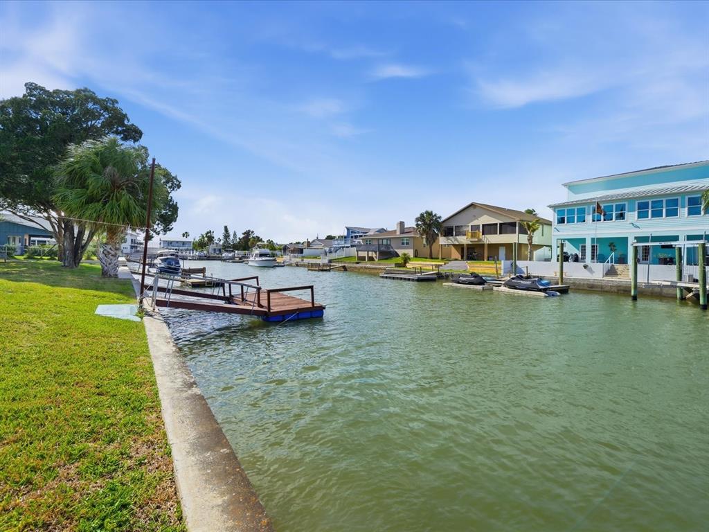 4069 Gulfview Drive Hernando Beach, FL 34607 - Photo 7 of 29 a view of a lake with houses