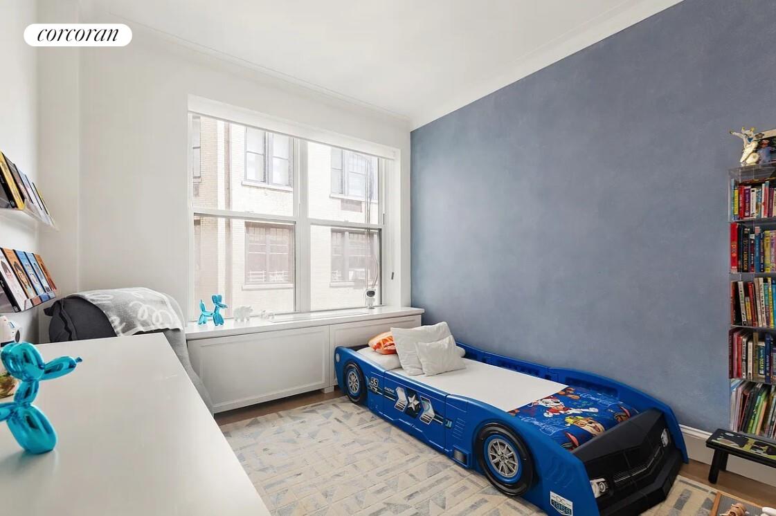 875 Park Avenue, Unit 4C Manhattan, NY 10075 - Photo 10 of 13 a bedroom with a bed and a window