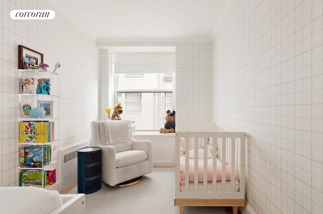 875 Park Avenue, Unit 4C Manhattan, NY 10075 - Photo 11 of 13 a living room with furniture and a window