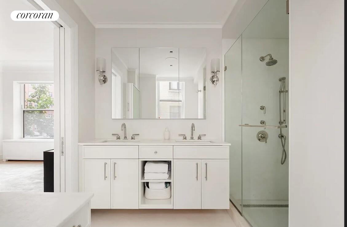 875 Park Avenue, Unit 4C Manhattan, NY 10075 - Photo 9 of 13 a bathroom with a double vanity sink mirror and