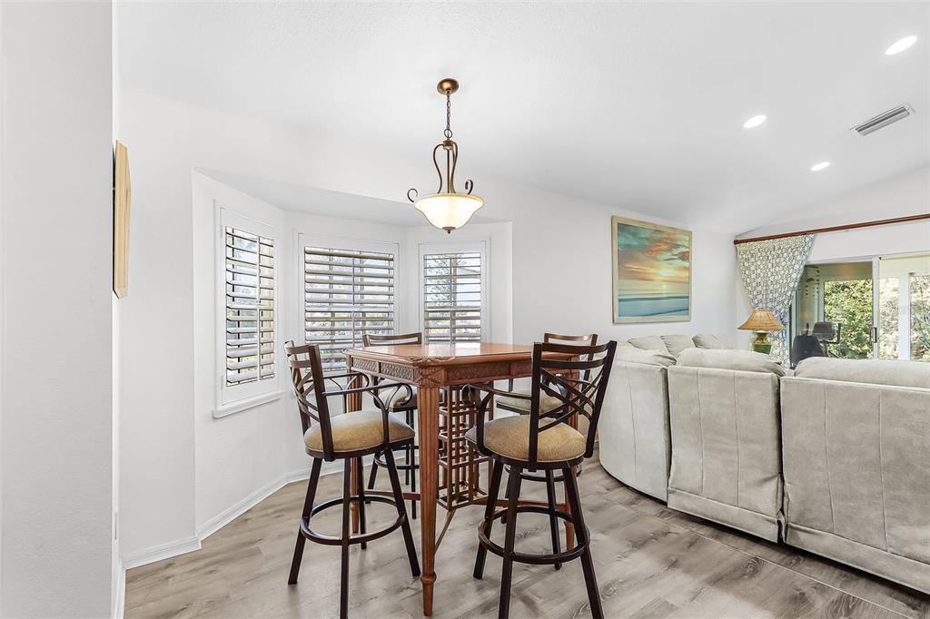 2031 Matecumbe Key Road Punta Gorda, FL 33955 - Photo 14 of 49 a view of a dining room with furniture window and outside view