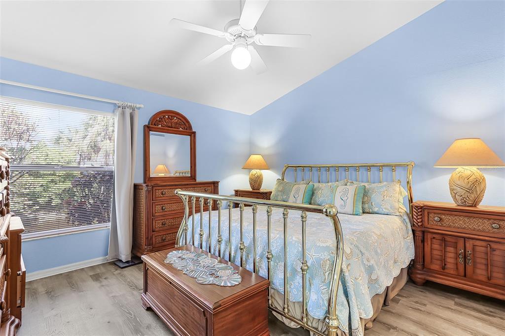 2031 Matecumbe Key Road Punta Gorda, FL 33955 - Photo 16 of 49 a bedroom with a bed and a window