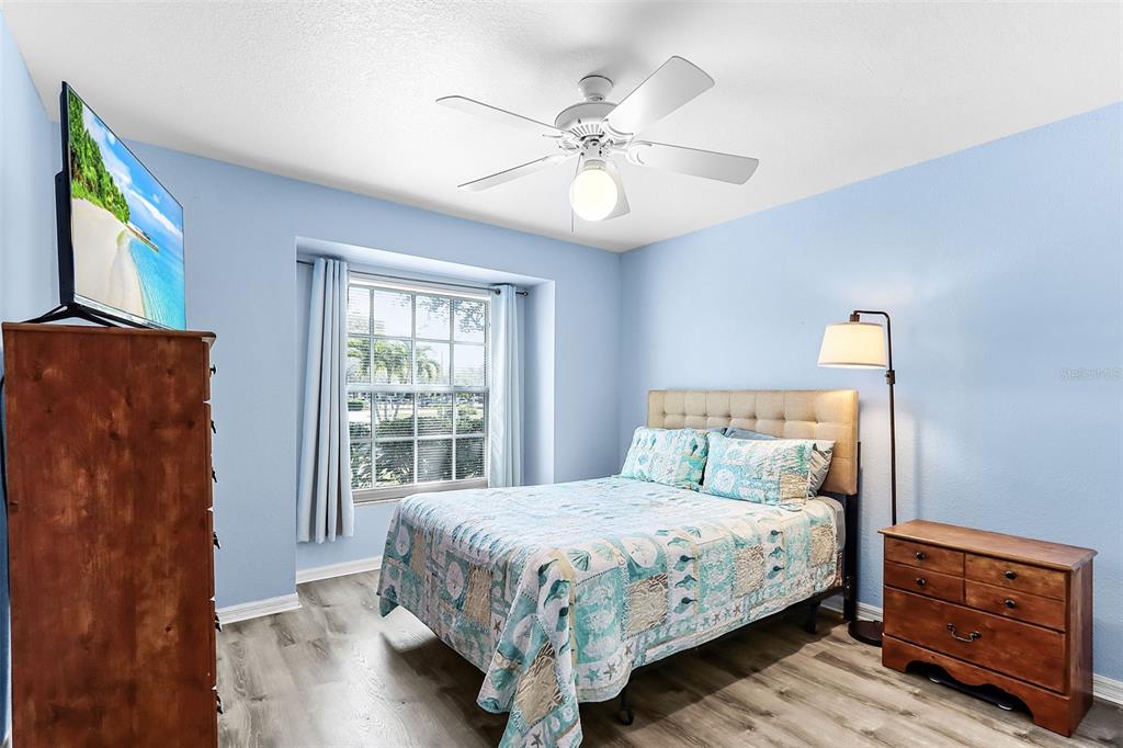 2031 Matecumbe Key Road Punta Gorda, FL 33955 - Photo 19 of 49 a bedroom with a bed and a window