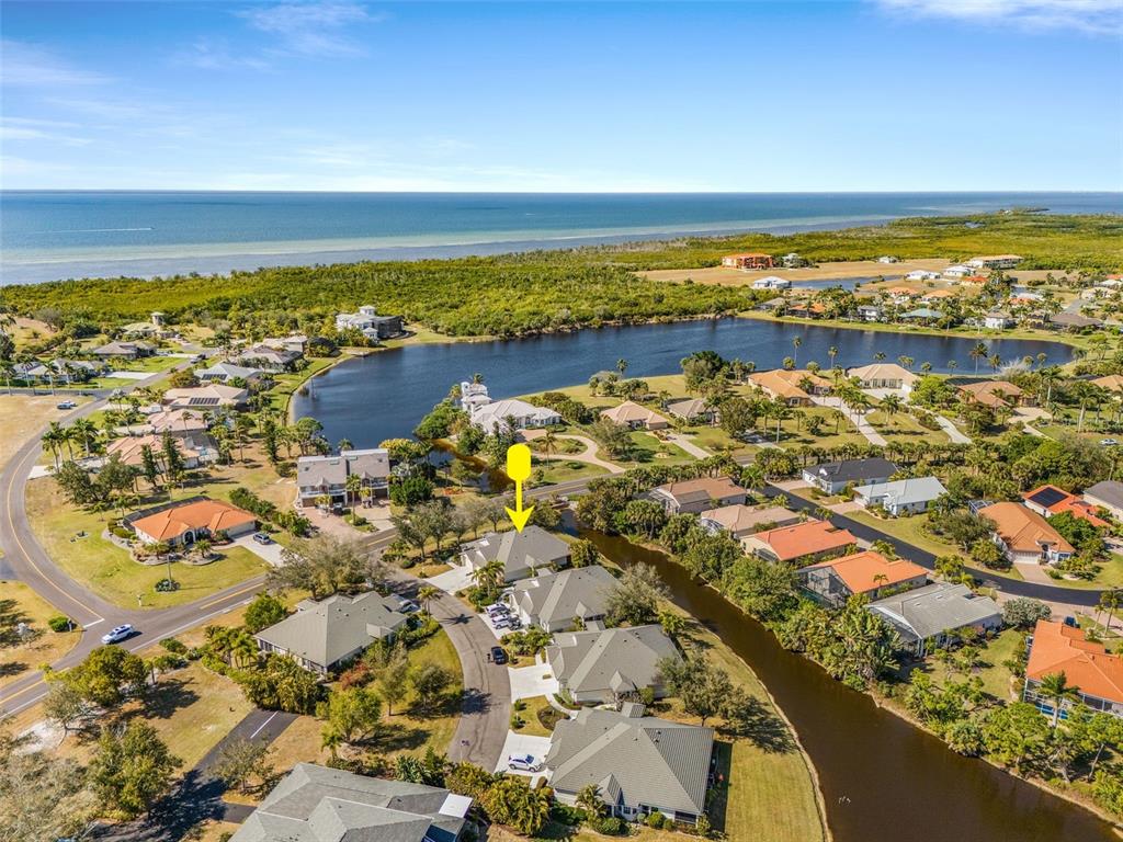 2031 Matecumbe Key Road Punta Gorda, FL 33955 - Photo 29 of 49 an aerial view of residential building and ocean