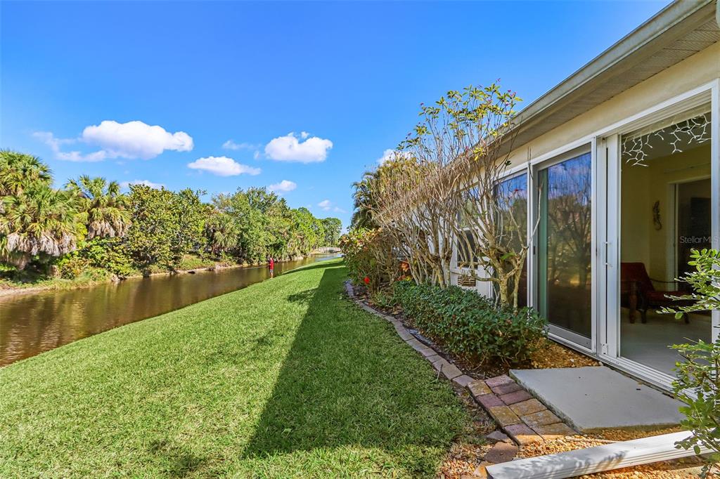 2031 Matecumbe Key Road Punta Gorda, FL 33955 - Photo 5 of 49 a view of a lake with a garden
