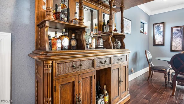 a view of a fireplace with wooden floor