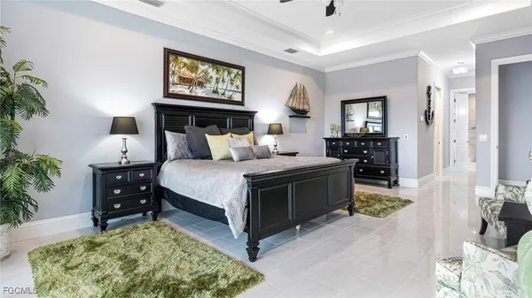 a bedroom with a bed and a night stand