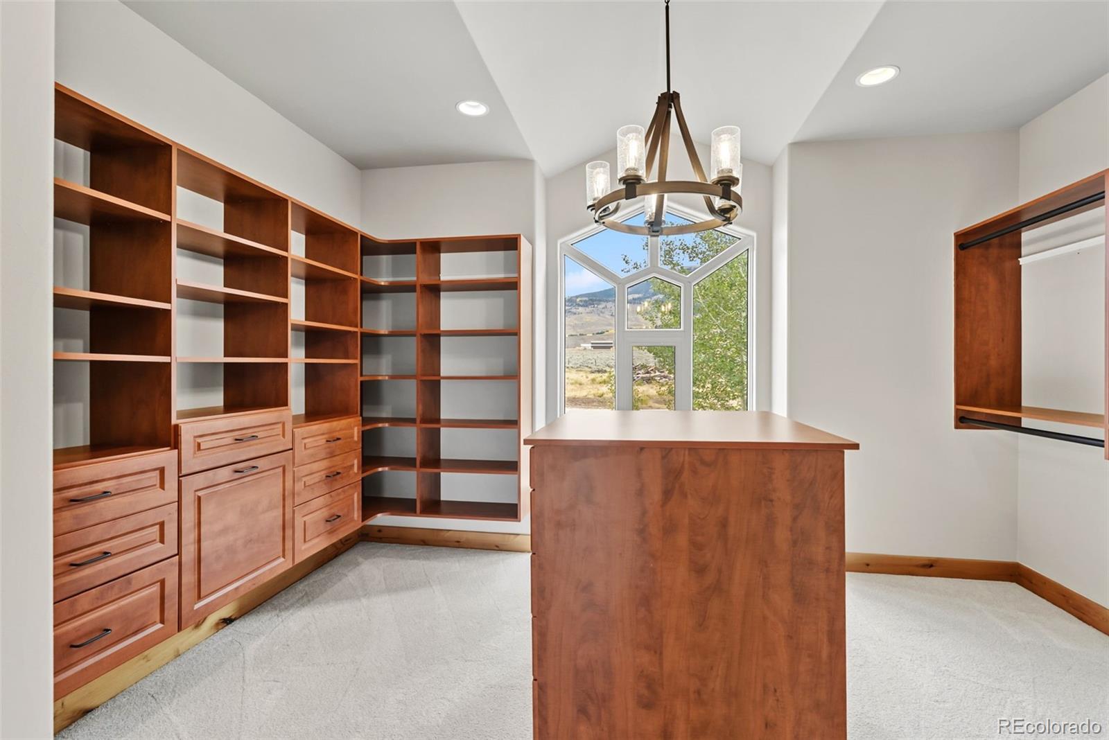 845 Elk Run Road Silverthorne, CO 80498 - Photo 19 of 50 a view of an empty room with cabinet and a window