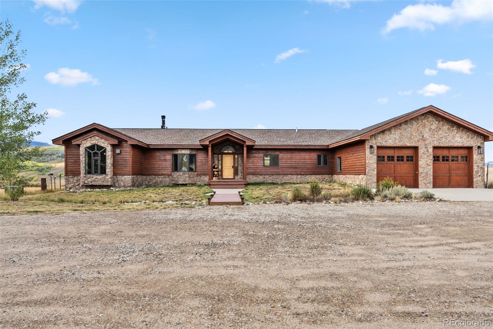 845 Elk Run Road Silverthorne, CO 80498 - Photo 22 of 50 a front view of a house with a yard