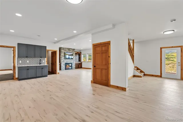 a view of a balcony with wooden floor