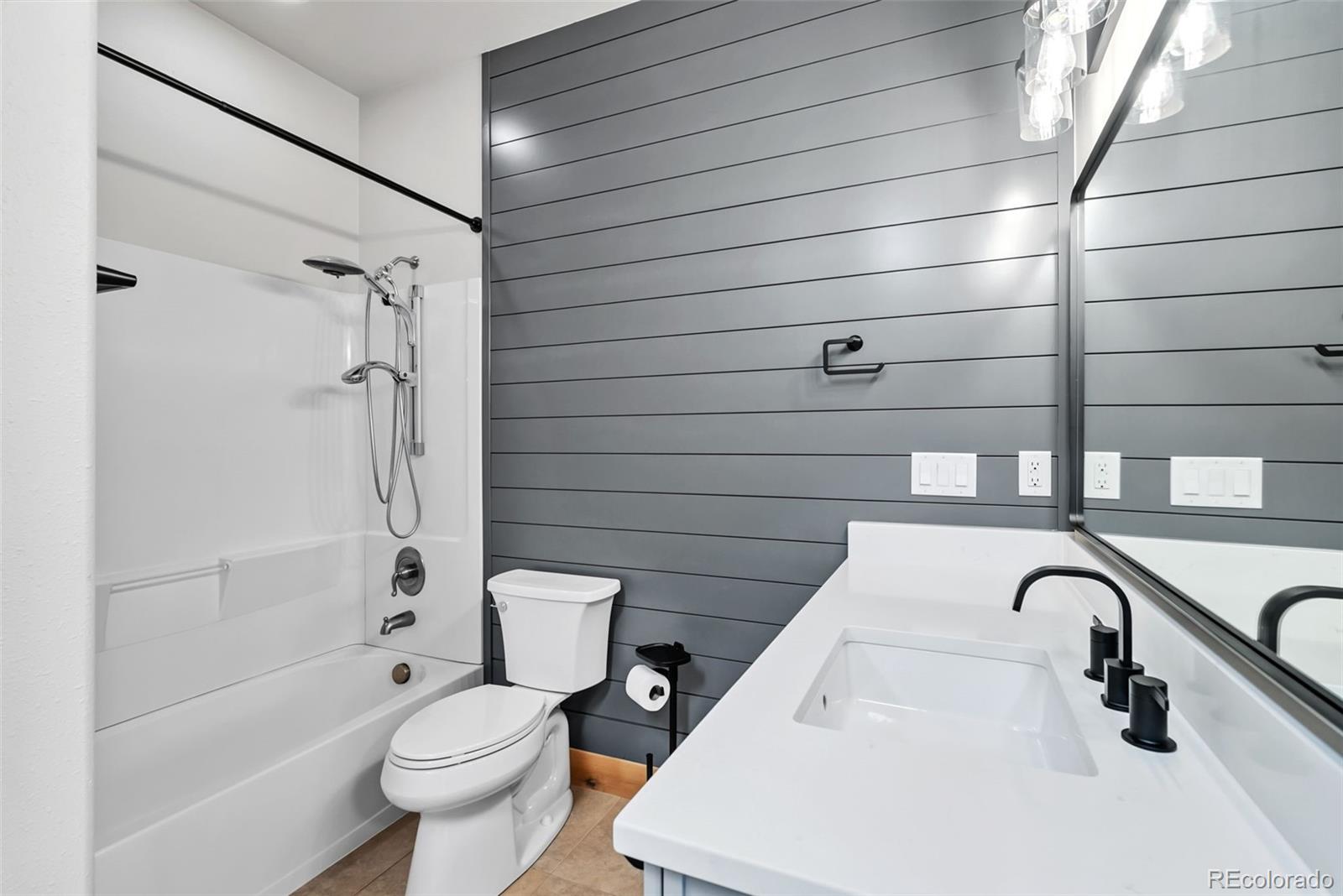 845 Elk Run Road Silverthorne, CO 80498 - Photo 43 of 50 a bathroom with a sink toilet and shower