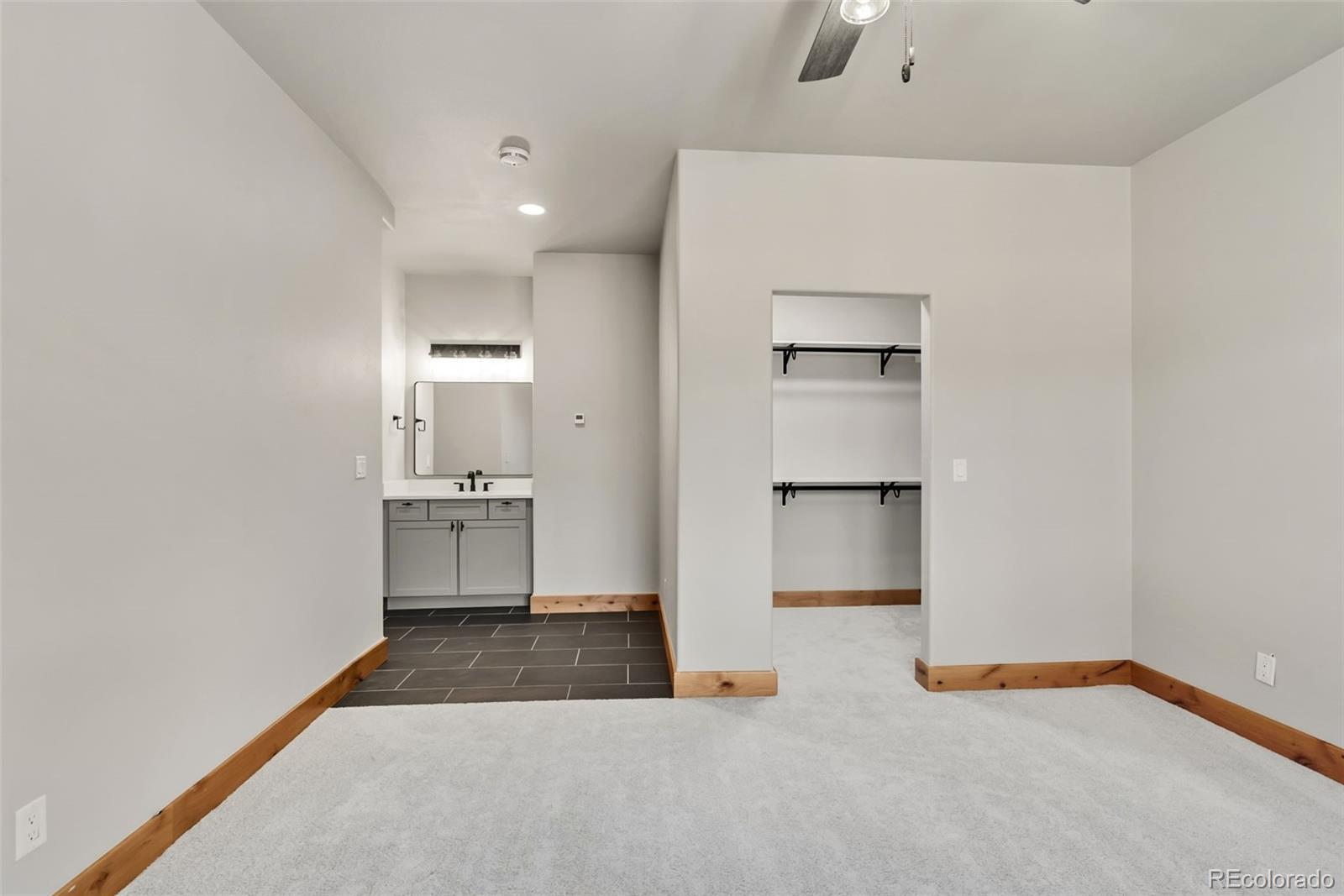 845 Elk Run Road Silverthorne, CO 80498 - Photo 44 of 50 a view of a kitchen with a sink and a refrigerator