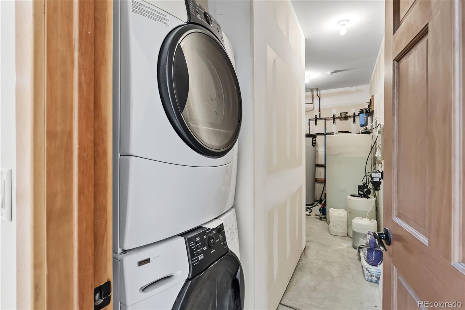 845 Elk Run Road Silverthorne, CO 80498 - Photo 46 of 50 a bathroom with a sink a toilet and a mirror