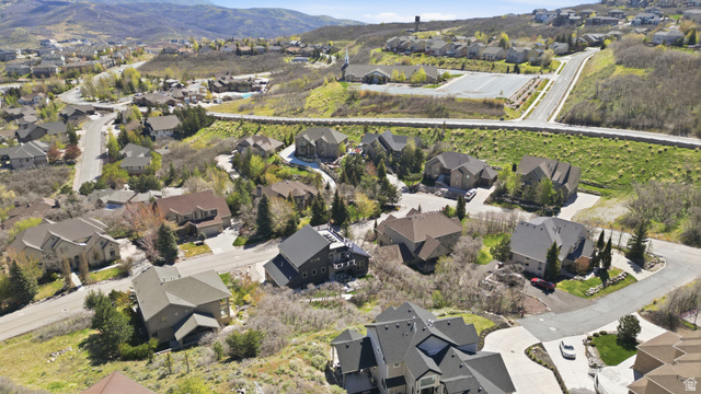 14902 Saddle Leaf Court Draper, UT 84020 - Photo 52 of 52 Aerial view of property and surrounding area with nearby suburban area and a mountainous background