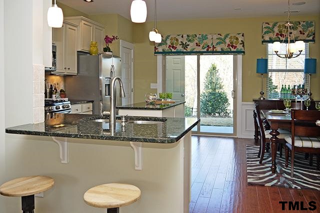 7900 Allscott Way Raleigh, NC 27612 - Photo 12 of 12 a dining room with furniture and window