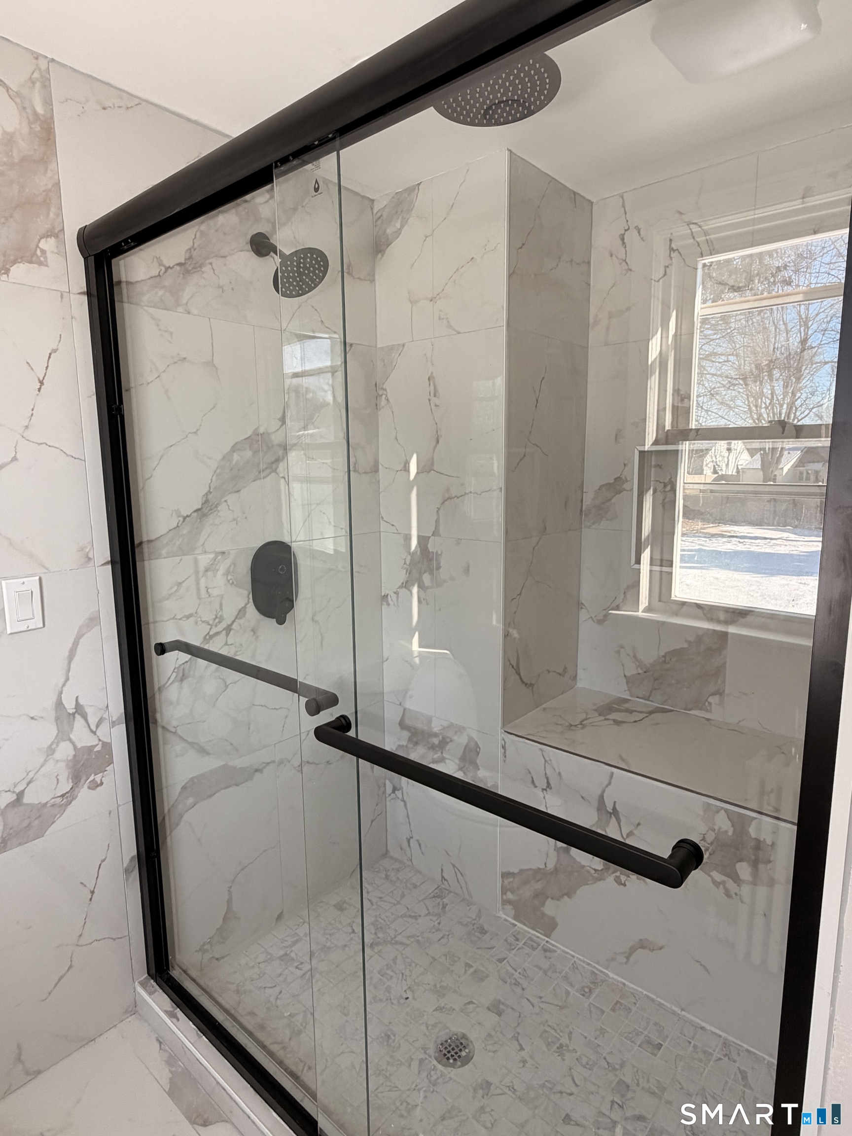 8 River Road East Haven, CT 06512 - Photo 11 of 45 a bathroom with a glass shower door