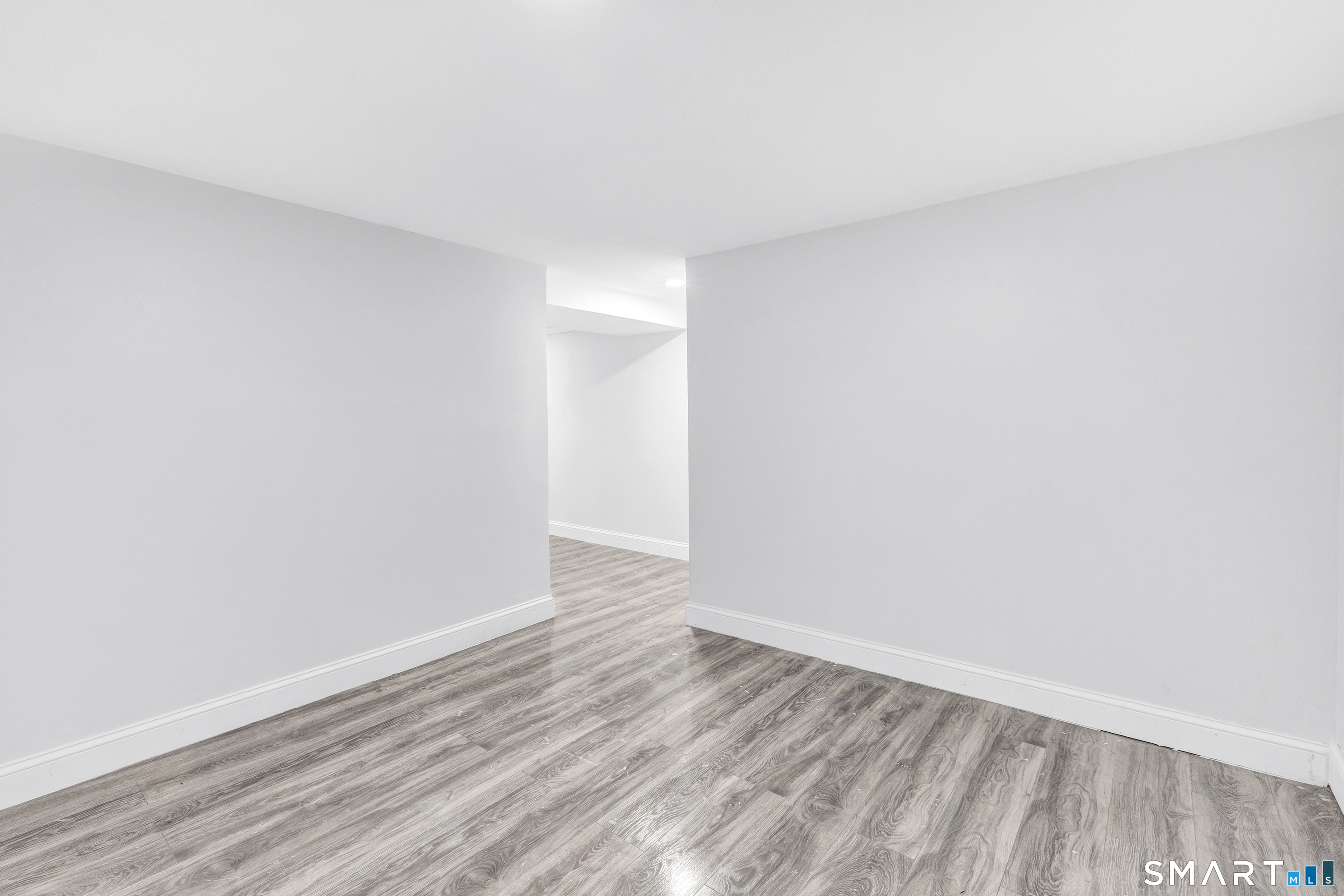 8 River Road East Haven, CT 06512 - Photo 38 of 45 a view of an empty room with wooden floor