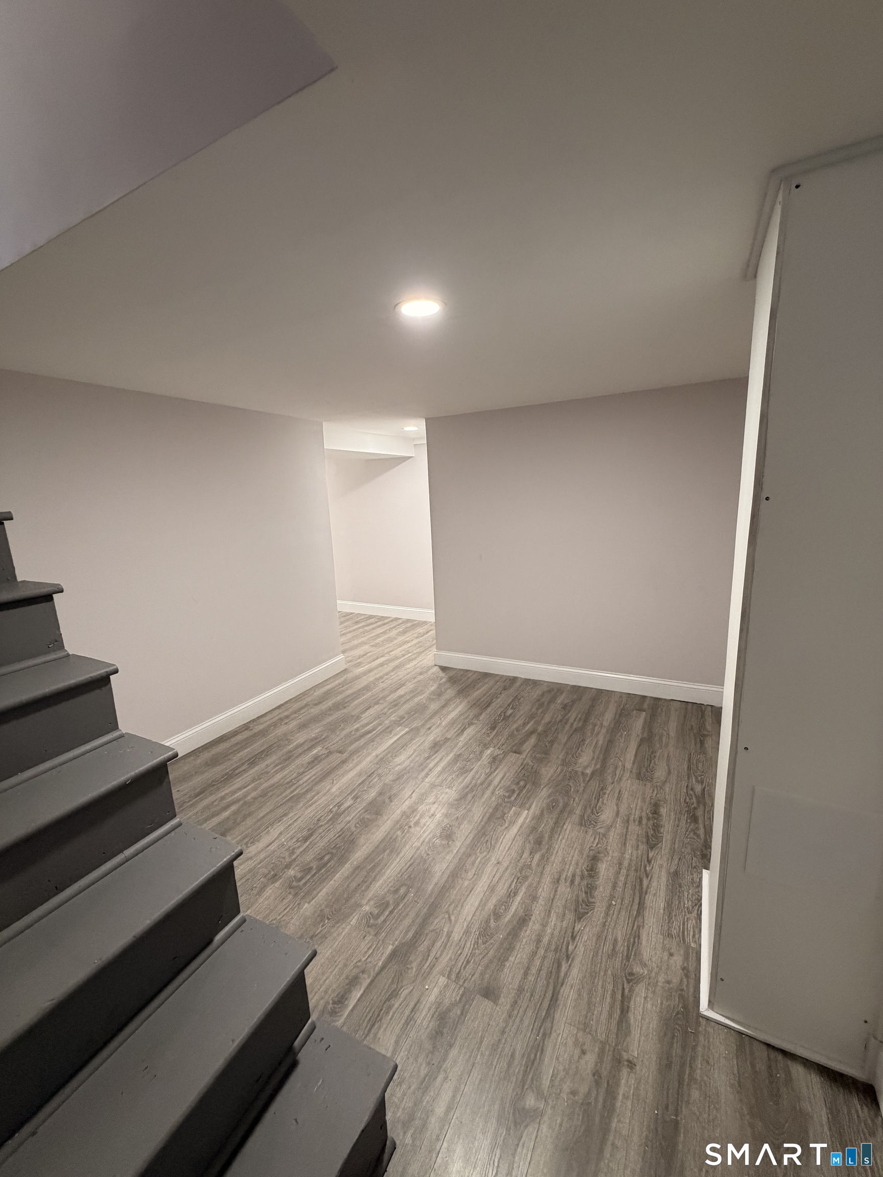 8 River Road East Haven, CT 06512 - Photo 39 of 45 a view of wooden floor and staircase