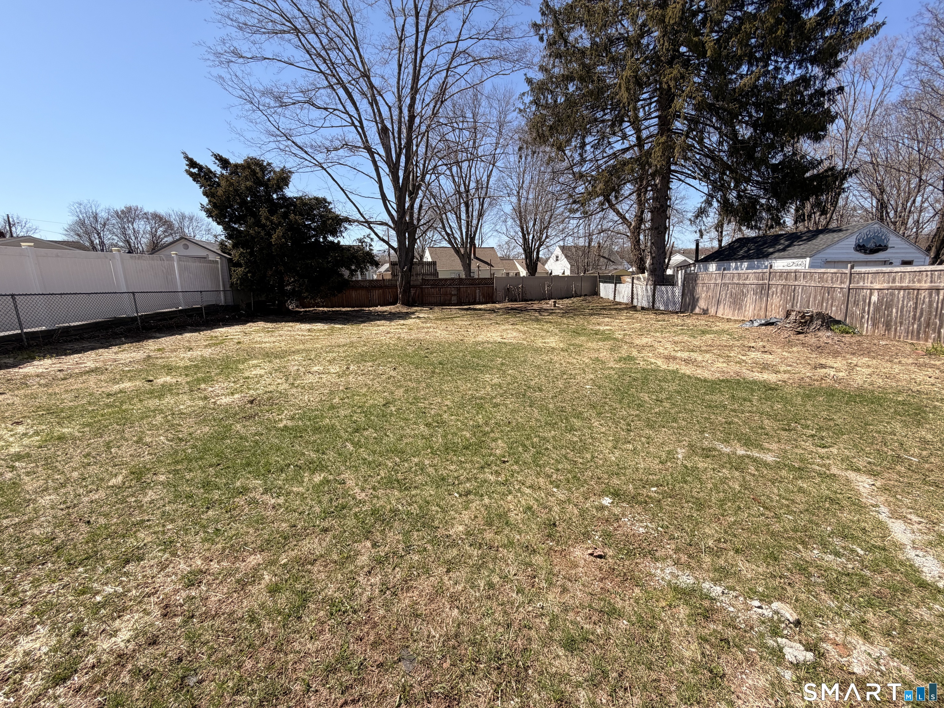 8 River Road East Haven, CT 06512 - Photo 44 of 45 a view of yard covered with snow in front of house