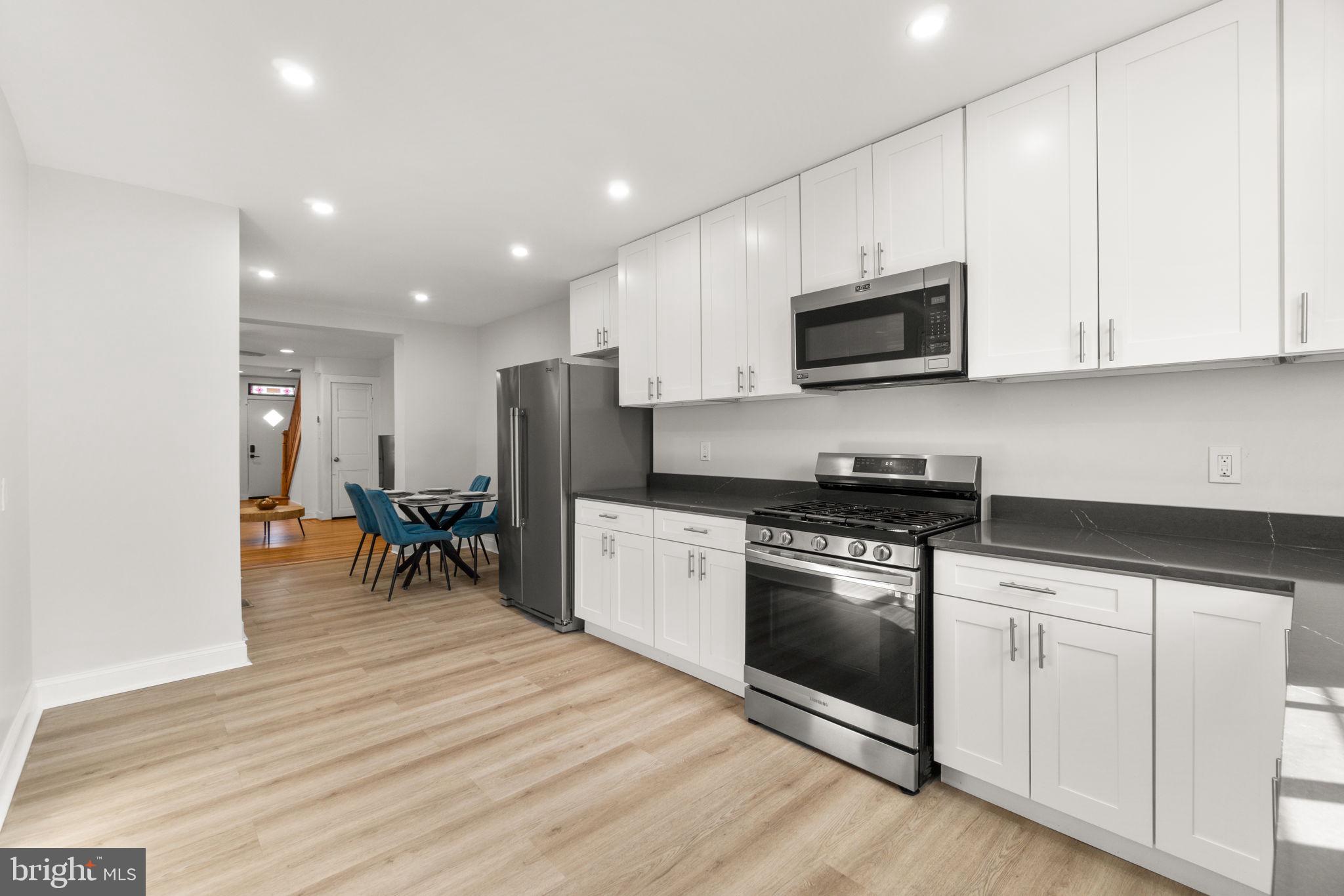 1827 Bank Street Baltimore, MD 21231 - Photo 12 of 31 Modern kitchen with sleek finishes.