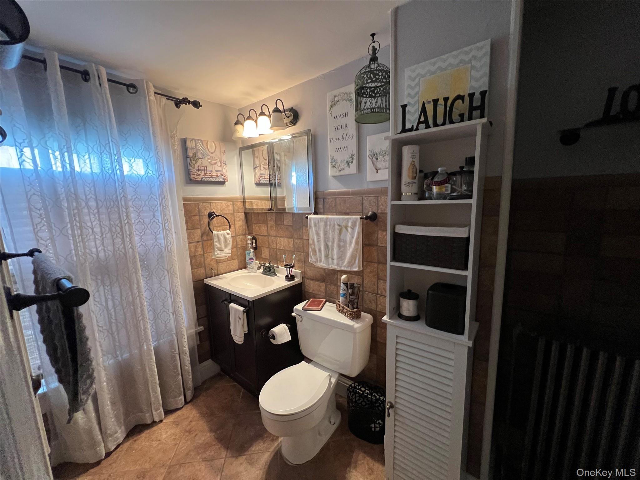 1731 Maple Avenue Peekskill, NY 10566 - Photo 7 of 15 a bathroom with a toilet sink and shower