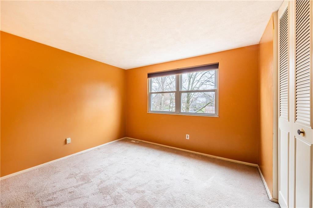 1069 Highfield Road Bethel Park, PA 15102 - Photo 19 of 41 an empty room with windows