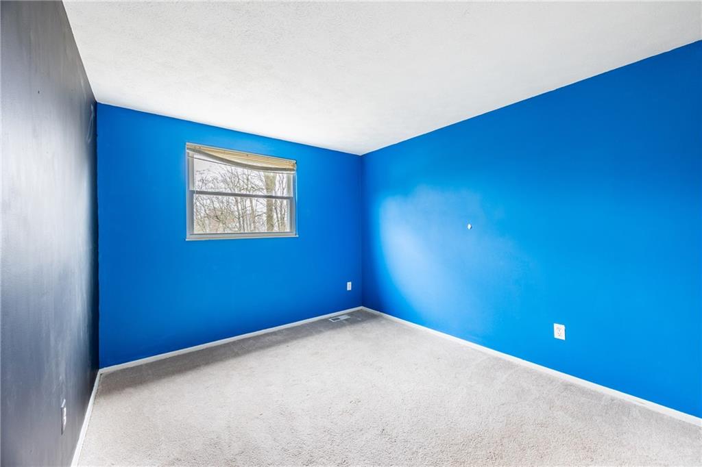 1069 Highfield Road Bethel Park, PA 15102 - Photo 25 of 41 a view of a room with window