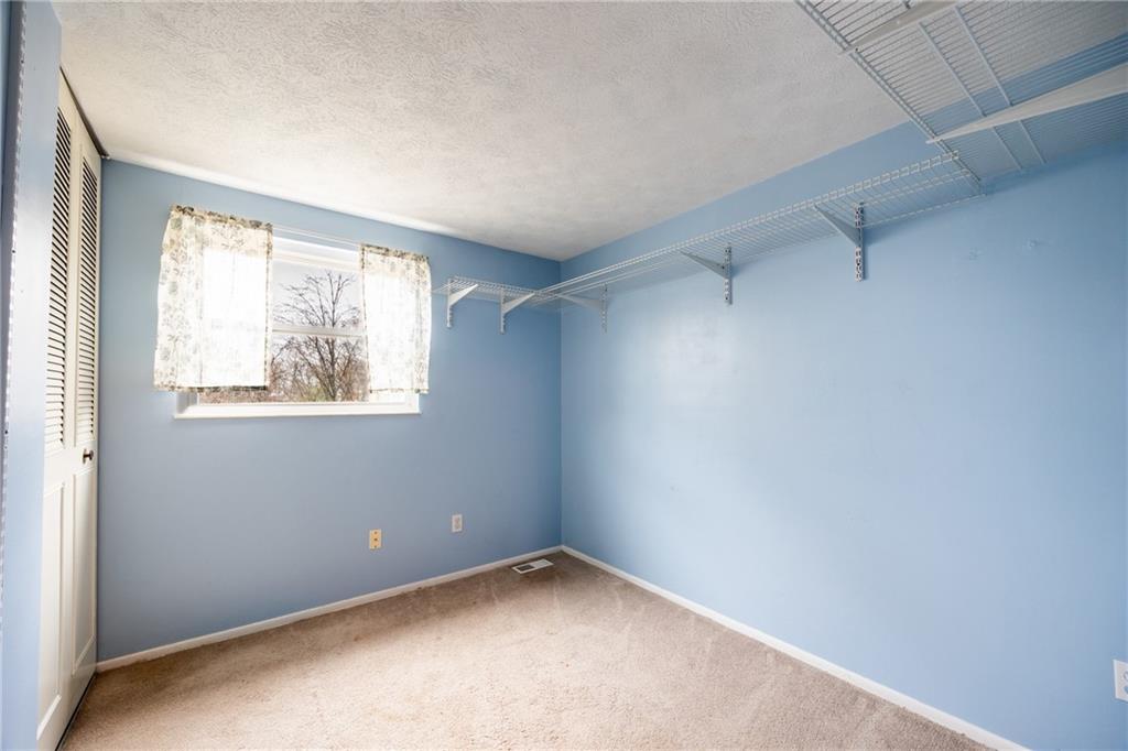 1069 Highfield Road Bethel Park, PA 15102 - Photo 27 of 41 an empty room with a window