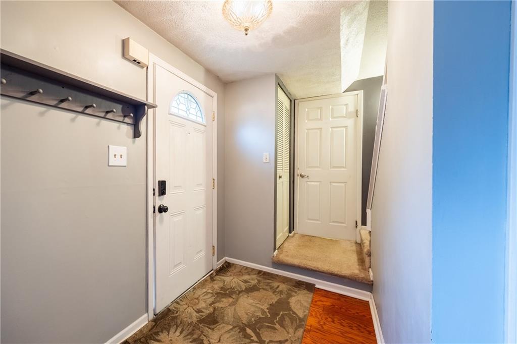 1069 Highfield Road Bethel Park, PA 15102 - Photo 3 of 41 a bathroom with a tub and shower