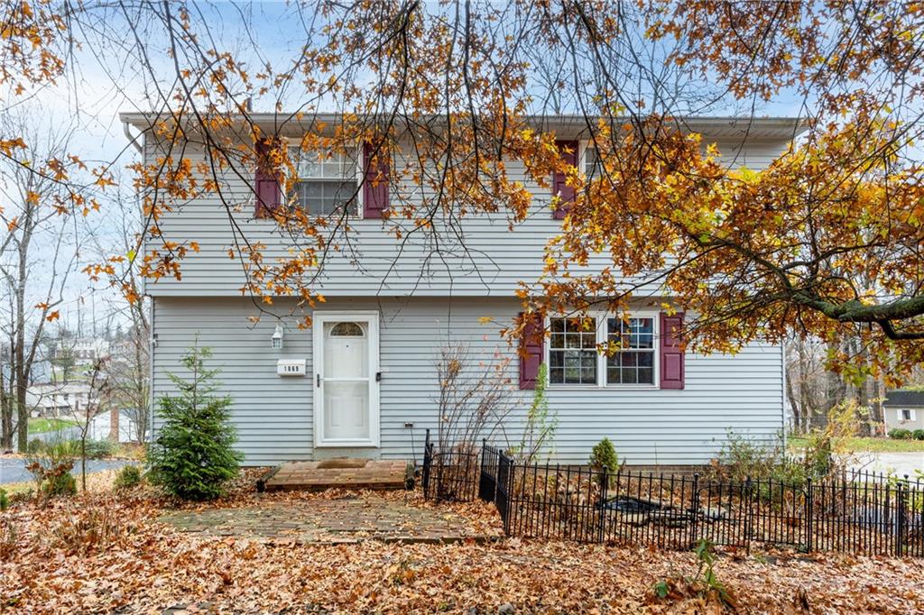 1069 Highfield Road Bethel Park, PA 15102 - Photo 41 of 41 a backyard of a house with table and chairs