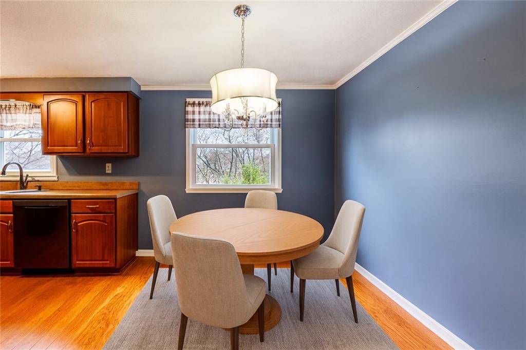 1069 Highfield Road Bethel Park, PA 15102 - Photo 10 of 41 a view of a dining room with furniture window and outside view