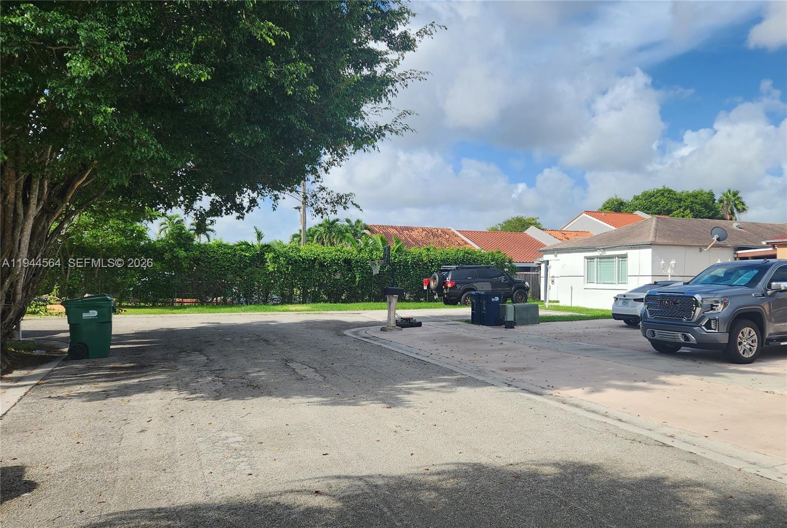 8254 Southwest 147th Place Miami, FL 33193 - Photo 1 of 14 a car parked in front of a house